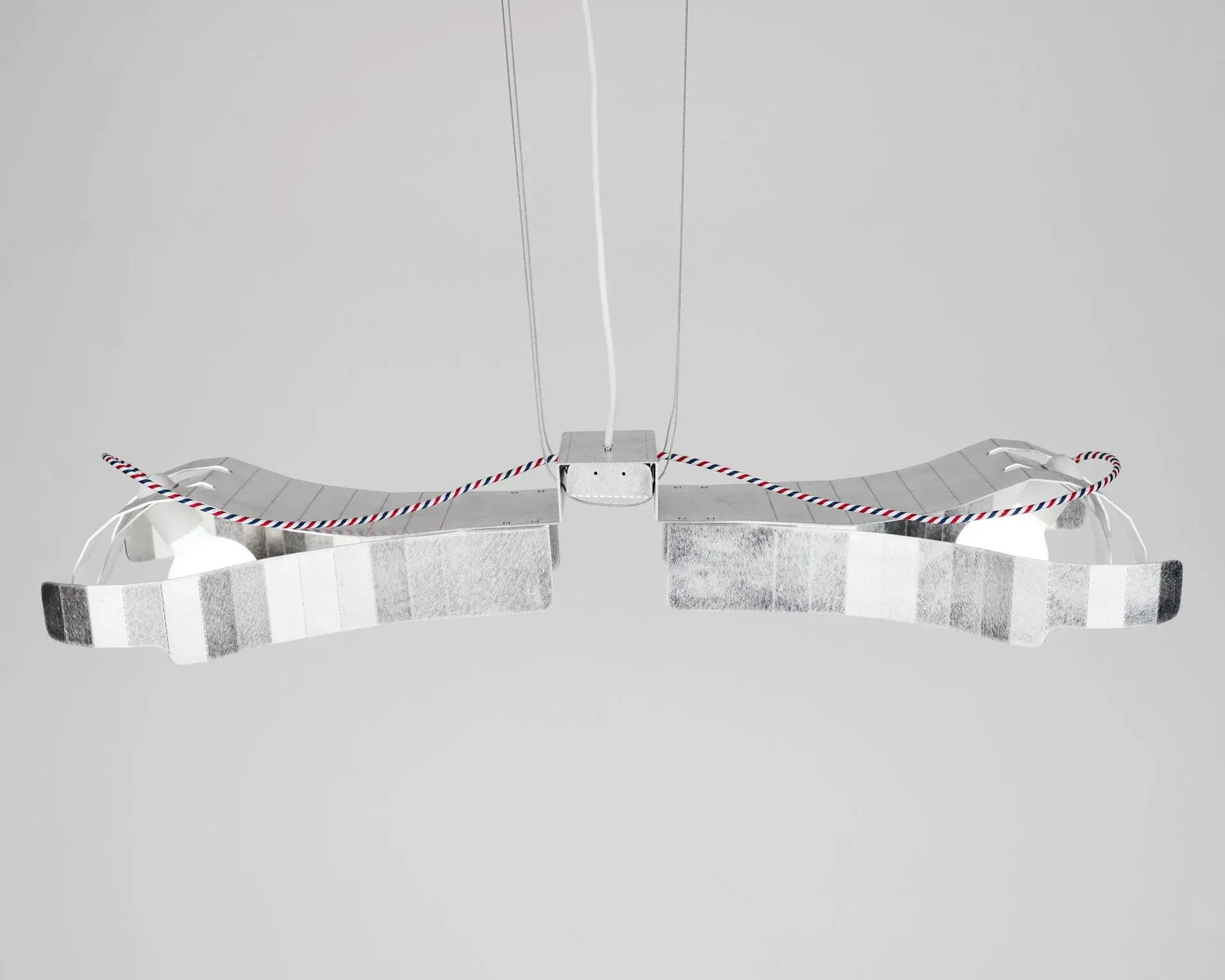 A couple of wires that are connected to a light fixture